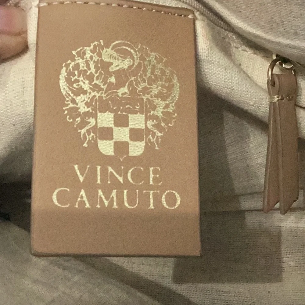 Vince Camuto small pebbled leather handbag with a braided strap and small tassel - Picture 6 of 10